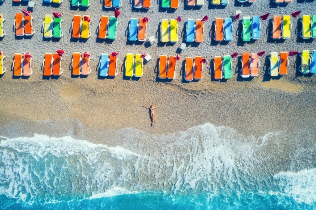 aerial view of lying woman on the beach 2022 03 30 20 23 32 utc