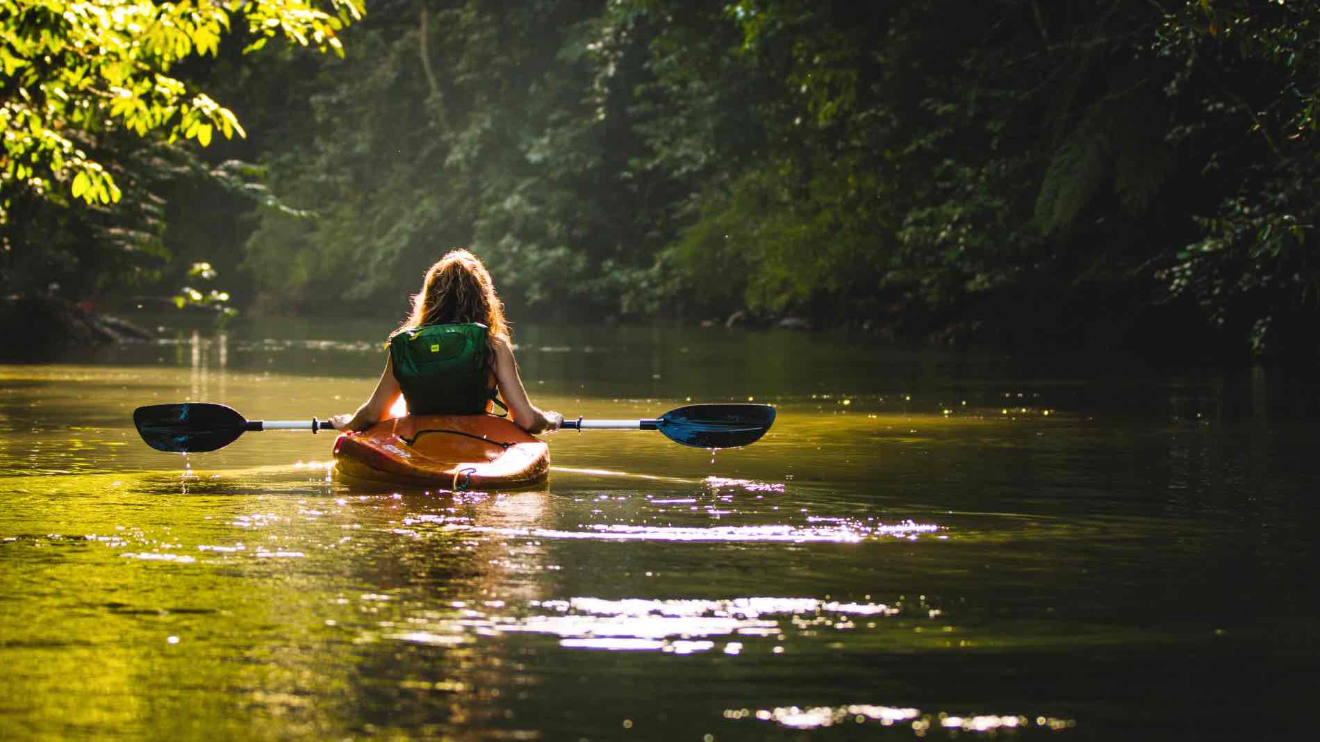 solo female canoeing