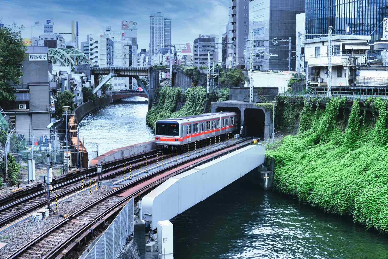 Train appearing from tunnel in Tokyo