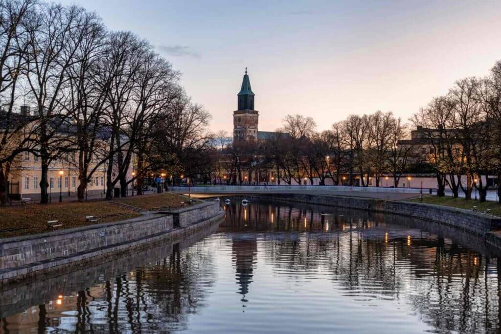 Aurajoki river and Turku Cathedral in autumn in Turku, Finland