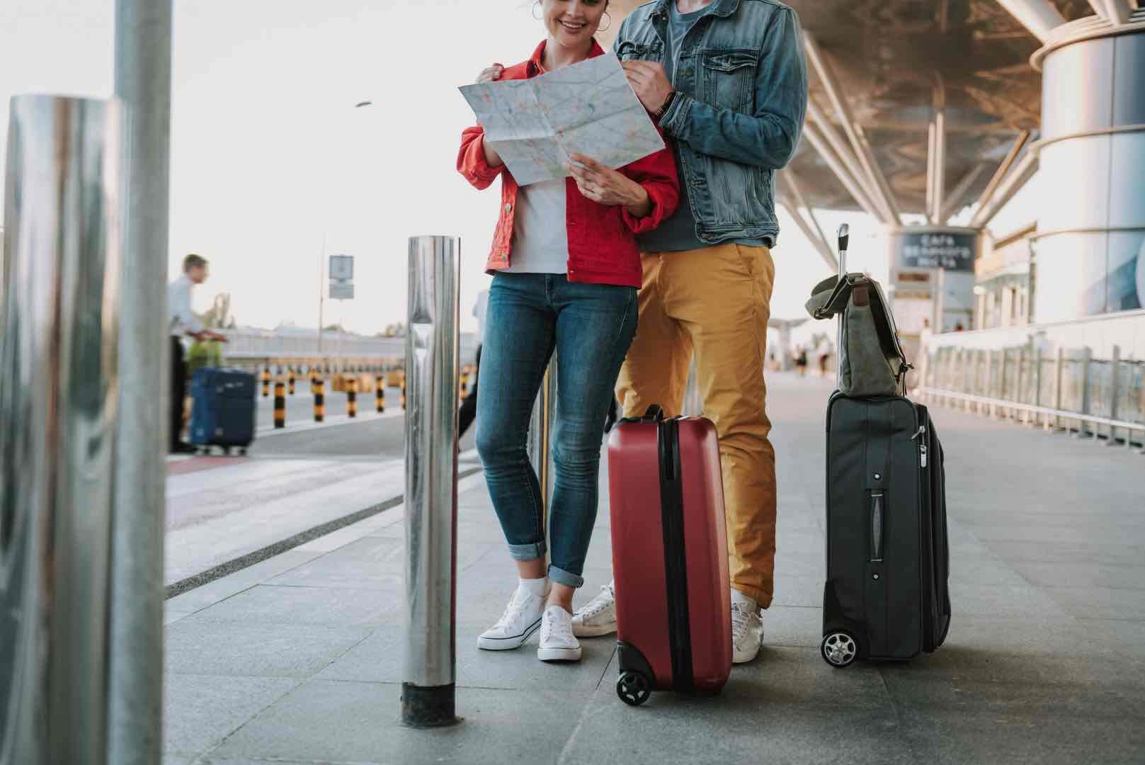 Couple leaving the airport planning their next moves