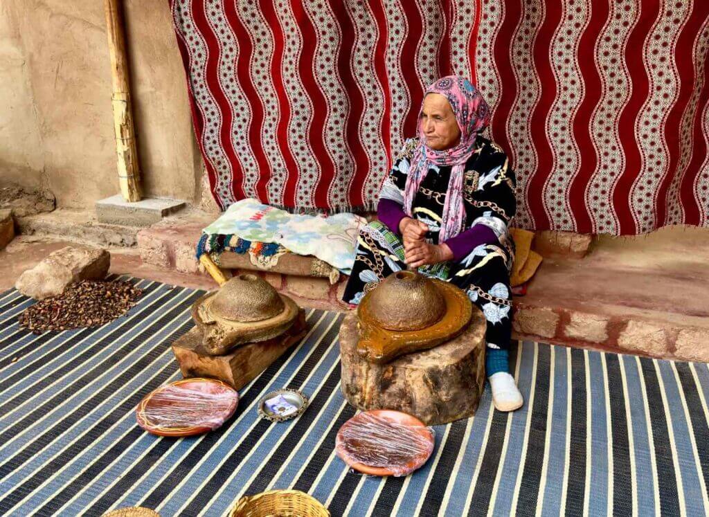 Woman making argan oil in Morocco