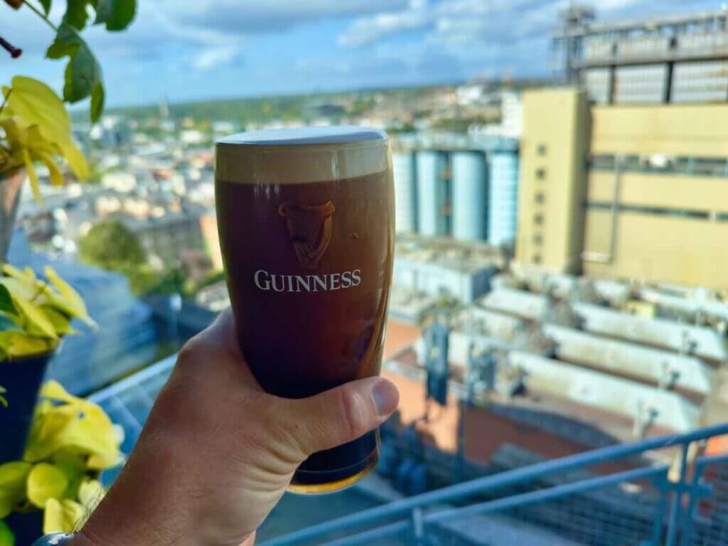 Poured pint of Guinness overlooking the brewery